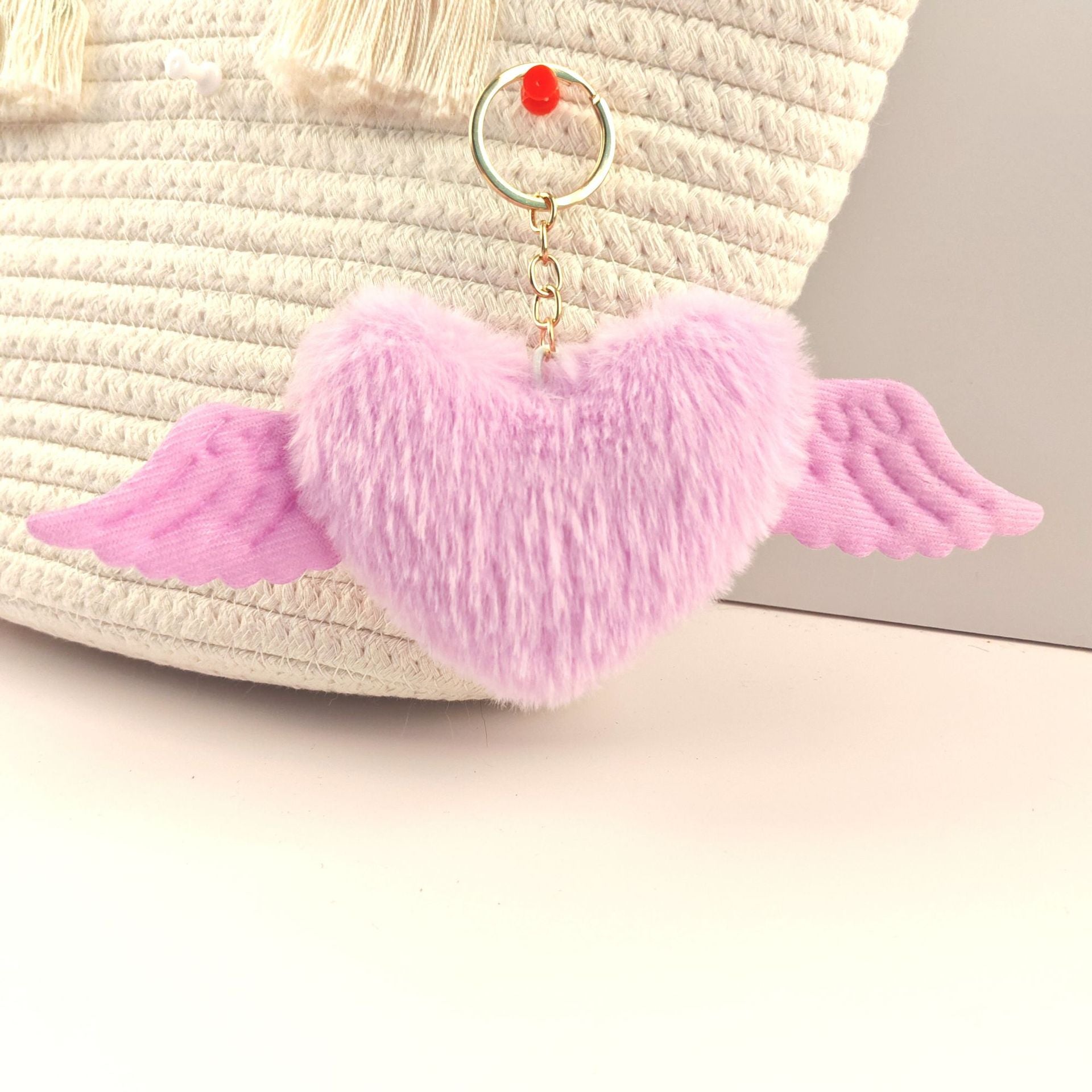 Wholesale Heart wings fur ball keychain